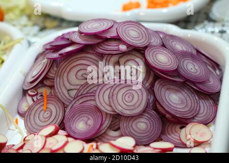 Red Crimean onion sliced into rings Stock Photo