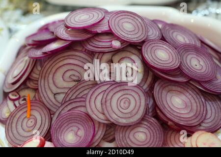 Red Crimean onion sliced into rings Stock Photo
