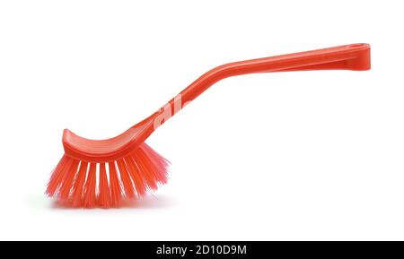 Red plastic dish brush isolated on white. Stock Photo