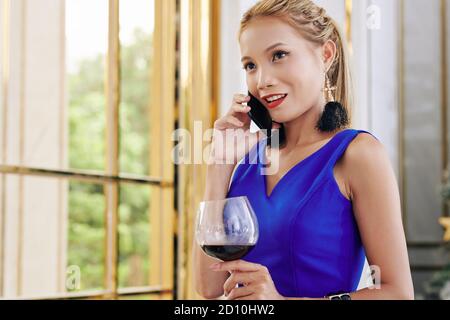 Beautiful woman talking on phone Stock Photo