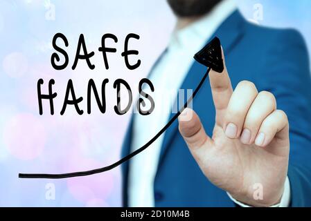 Conceptual hand writing showing Safe Hands. Concept meaning Ensuring the sterility and cleanliness of the hands for decontamination Digital arrowhead Stock Photo