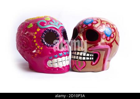 Isolated shot of vibrant decorative skull souvenirs Stock Photo
