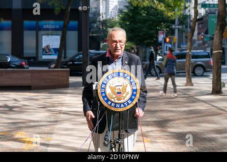 New York, United States. 04th Oct, 2020. U.S. Senator Chuck Schumer holds weekly press briefing in front of 780 3rd avenue in Manhattan, New York on October 4, 2020. Senator called on Majority Leader Mitch McConnell to delay Judiciary Committee hearings on Supreme Court nominee Judge Amy Coney Barrett. Senator also demanded full transparency on President Trump's health. (Photo by Lev Radin/Sipa USA) Credit: Sipa USA/Alamy Live News Stock Photo