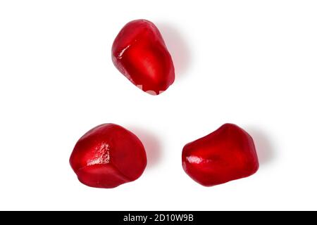 Pomegranate seeds close up isolated on white background Stock Photo