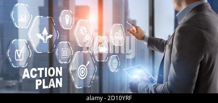 Man is drawing on virtual screen. Action plan concept. Stock Photo