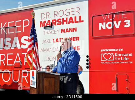 El Dorado, Kansas, USA. 3rd Oct, 2020. Congressman Ron Estes (R-KS) who is running for re-election in the 4th congressional district addresses the small crowd of supporters at the kick off the Keep Kansas Great Bus Tour in El Dorado, Kansas on October 3, 2020. Credit: Mark Reinstein/Media Punch/Alamy Live News Stock Photo