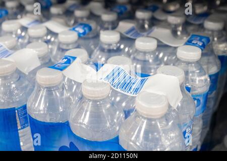 Plastic bottles of water on sale in a supermarket in Cardiff, Wales, United Kingdom. Stock Photo