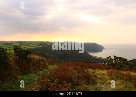 Sunset view out to the Bristol Channel, across Lee Abbey Deacon, Lynton, Exmoor, North Devon, England, UK Stock Photo