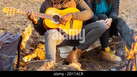 Cropped of mixed race couple enjoying time at forest Stock Photo