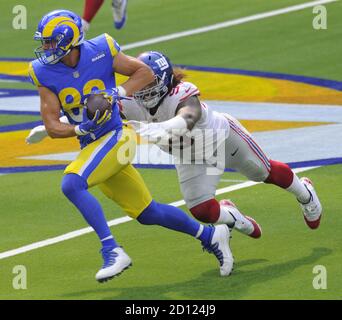 Inglewood, United States. 04th Oct, 2020. Los Angeles Rams' Johnny Mundt tries to get away from New York Giants' Leonard Williams in the first half at SoFi Stadium in Inglewood, California on Sunday, October 4, 2020. Photo by Lori Shepler/UPI Credit: UPI/Alamy Live News Stock Photo