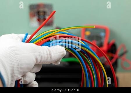 Tools for electrician needs: multimeter, voltage testers, wire strippers, pliers, Stock Photo