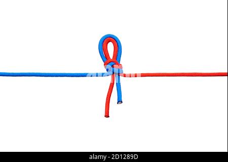 Two red and blue cords are connected . Knot on a cord isolated on a white background . Stock Photo