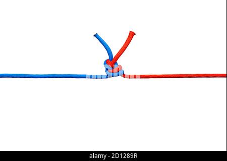 Two red and blue cords are connected . Knot on a cord isolated on a white background . Stock Photo