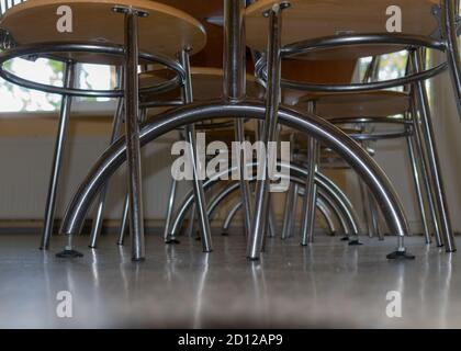 school kitchen canteen, metal table and chair legs, canteen equipment, catering establishment, tables and chairs Stock Photo