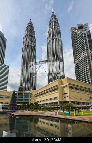 Kuala Lumpur, Malaysia - December 2, 2019: Cityscape of the Petronas Twin Towers and buildings in Kuala Lumpur city, Malaysia. Stock Photo