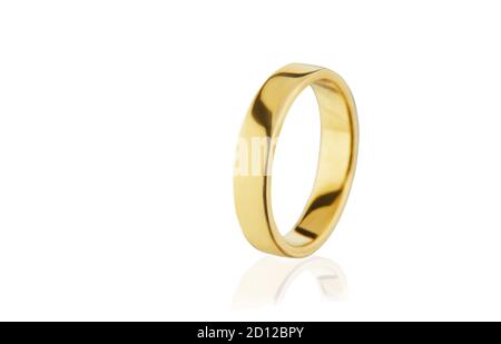 Yellow gold wedding ring isolated on white background. Stock Photo