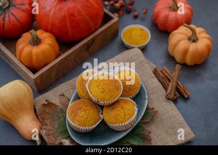 sweet home made vanilla pumpkin muffins on a table Stock Photo