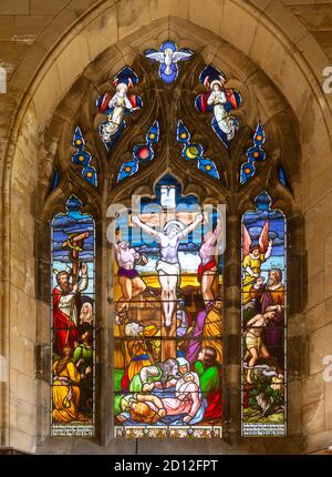 Stained glass window of Crucifixion in church of Saint Mary, Nempnett Thrubwell, Somerset, England, UK Stock Photo