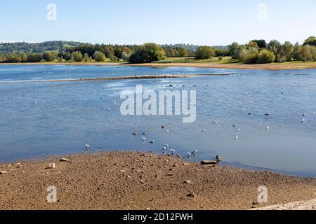 Low water level Bristol Water, Chew Valley reservoir lake, Herons Green Bay, Somerset, England, UK submerged road exposed Stock Photo