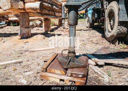Support spare part for construction equipment. Construction site. Close up. Stock Photo