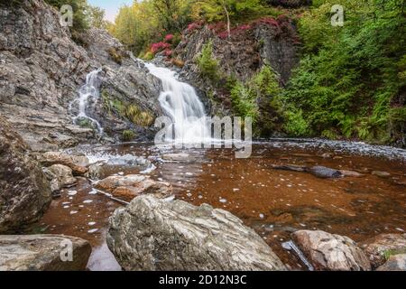 Beautiful waterfall in the autumn forest of Malmedy, Ardennes, Belgium. Stock Photo