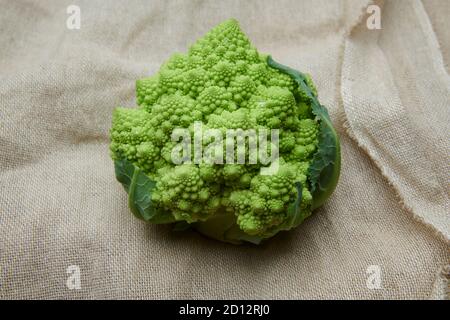 Romanesco (Brassica oleracea), on a hessian bag, England, UK, GB, Stock Photo