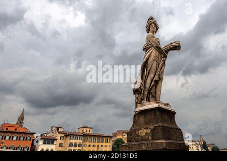 Florence, marble statue, symbol of summer, on the Ponte Santa Trinita (Ancient bridge, XVI century), sculptor Giovanni Battista Caccini (1556-1613). Stock Photo