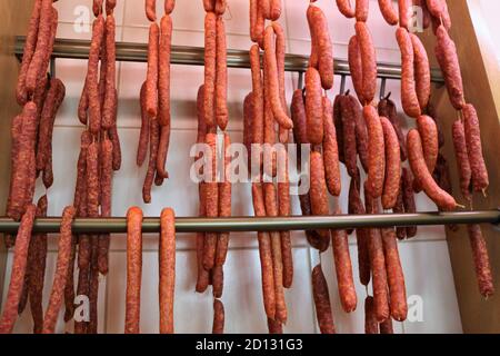 Air dried sausage in a butchery Stock Photo