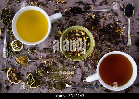 Herbal and natural dry tea set, variation and collection of tea and vintage spoons Stock Photo