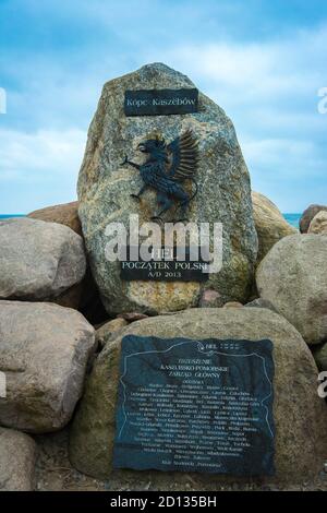 HEL, POLAND - May 05, 2019: Stone obelisk at Hel. The beginning of Poland. Kashubian mound. Stock Photo