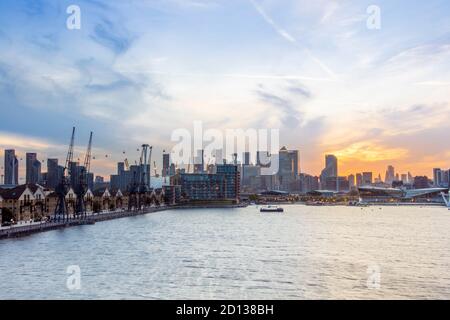 UK, London, Docklands. Central Business District from East London, showing Royal Victoria Docks, O2 Millennium Dome & the Emirates Cable Car Stock Photo