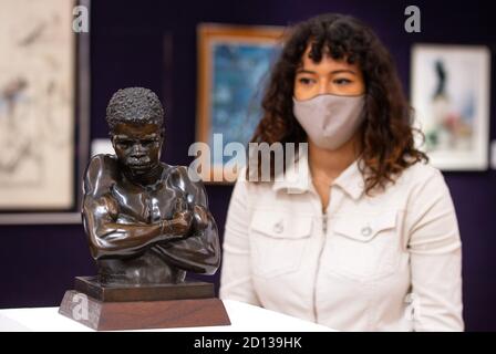 London, UK. 5th Oct, 2020. 'Shangaan' by Anton Van Wouw, estimate £25,000- 30,000. Press Preview of Modern and Contemporary African Art sale at Bonhams Auction House. The auction is on October 8th. Credit: Mark Thomas/Alamy Live News Stock Photo