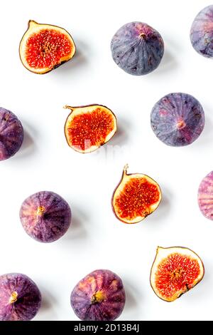 Pattern of whole and sliced figs. Overhead view Stock Photo