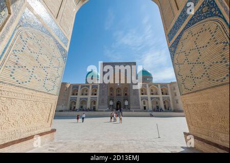Mir-i Arab Madrassah seen from the Kalan Mosque, . Bukhara, Uzbekistan Stock Photo