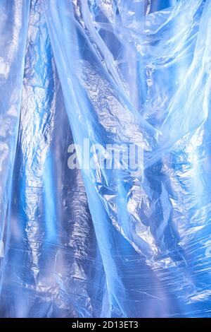 Abstract blue background of colorful textured holographic polyethylene Stock Photo
