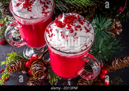 Trendy original winter Christmas hot chocolate recipe idea, Red velvet hot chocolate over festive background copy space Stock Photo