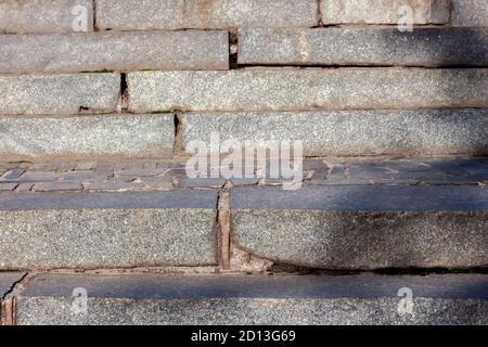 Background from marble and granite stones laid out in masonry Stock Photo