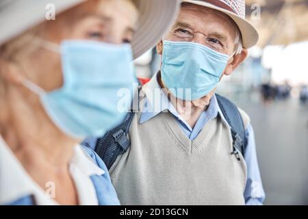 Aged Caucasian man staring at his spouse Stock Photo