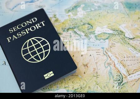 second Passport on the world map ,Ease of travel Stock Photo