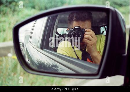 Self portrait on a ear view mirror, Devon, England, United Kingdom. Stock Photo