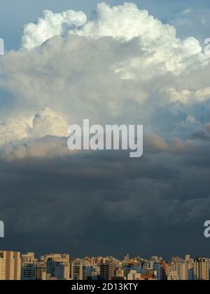 Beautiful view of a dramatic dark and stormy sky in the city. Stock Photo