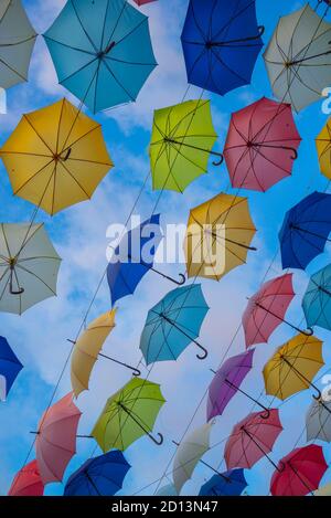 Beautiful color umbrellas on the street. Arcadia part of Odessa, Ukraine Stock Photo