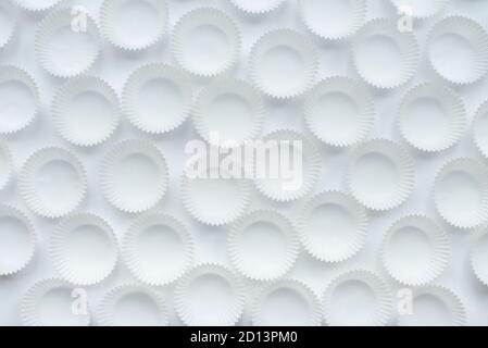 Empty paper cupcakes molds on white background Stock Photo