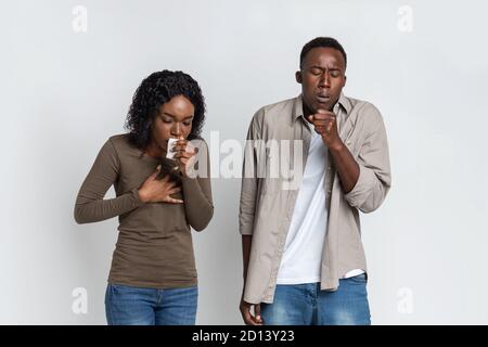 Sick African American Couple Suffering From Covid-19 Infection Stock Photo