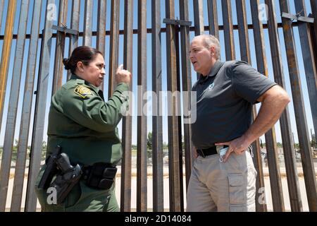 U.S. Customs and Border Protection Acting Commissioner Mark Morgan tours a completed section of the U.S. - Mexico border wall along with U.S. Border Patrol Sector Chief Gloria I. Chavez and other senior Border Patrol officials during a visit to El Paso, Texas, August 26, 2020. CBP Stock Photo