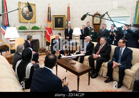 President Trump and The First Lady Participate in an Abraham Accords Signing Ceremony. President Donald J. Trump, joined by Vice President Mike Pence, meets with the Minister of Foreign Affairs and International Cooperation of the United Arab Emirates Sheikh Abdullah bin Zayed bin Sultan Al Nahan on Tuesday, Sept. 15, 2020, in the Oval Office of the White House. Stock Photo