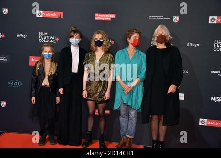 Cologne, Germany. 03rd Oct, 2020. Actor Felizia Trube, l-r, Momo Beier, Stella Holzapfel, Margarita Broich and director Petra Seeger comes to the screening of the film 'VATERSLAND' at the Film Festival Cologne. Credit: Horst Galuschka/dpa/Alamy Live News Stock Photo