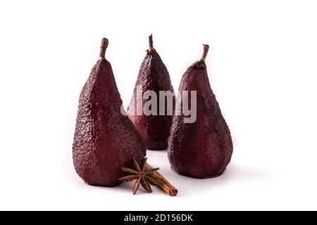 Poached pears in red wine isolated on white background Stock Photo