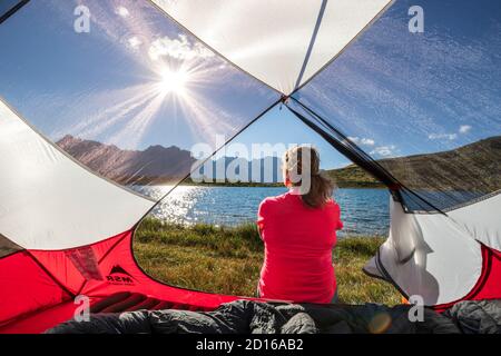 France, Hautes-Alpes, Névache, valley of La Clarée, bivouac on the shore of Lake Laramon (2359 m) at sunset, in the background the Cerces massif (3093 Stock Photo