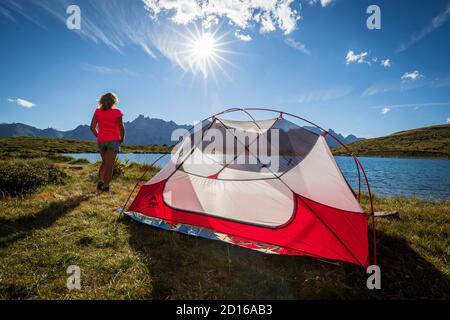 France, Hautes-Alpes, Névache, valley of La Clarée, bivouac on the shore of Lake Laramon (2359 m) at sunset, in the background the Cerces massif (3093 Stock Photo